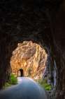 USA, New Mexico, Jemez National Recreation Area. Gilman tunnels cut through cliffs. Art Print